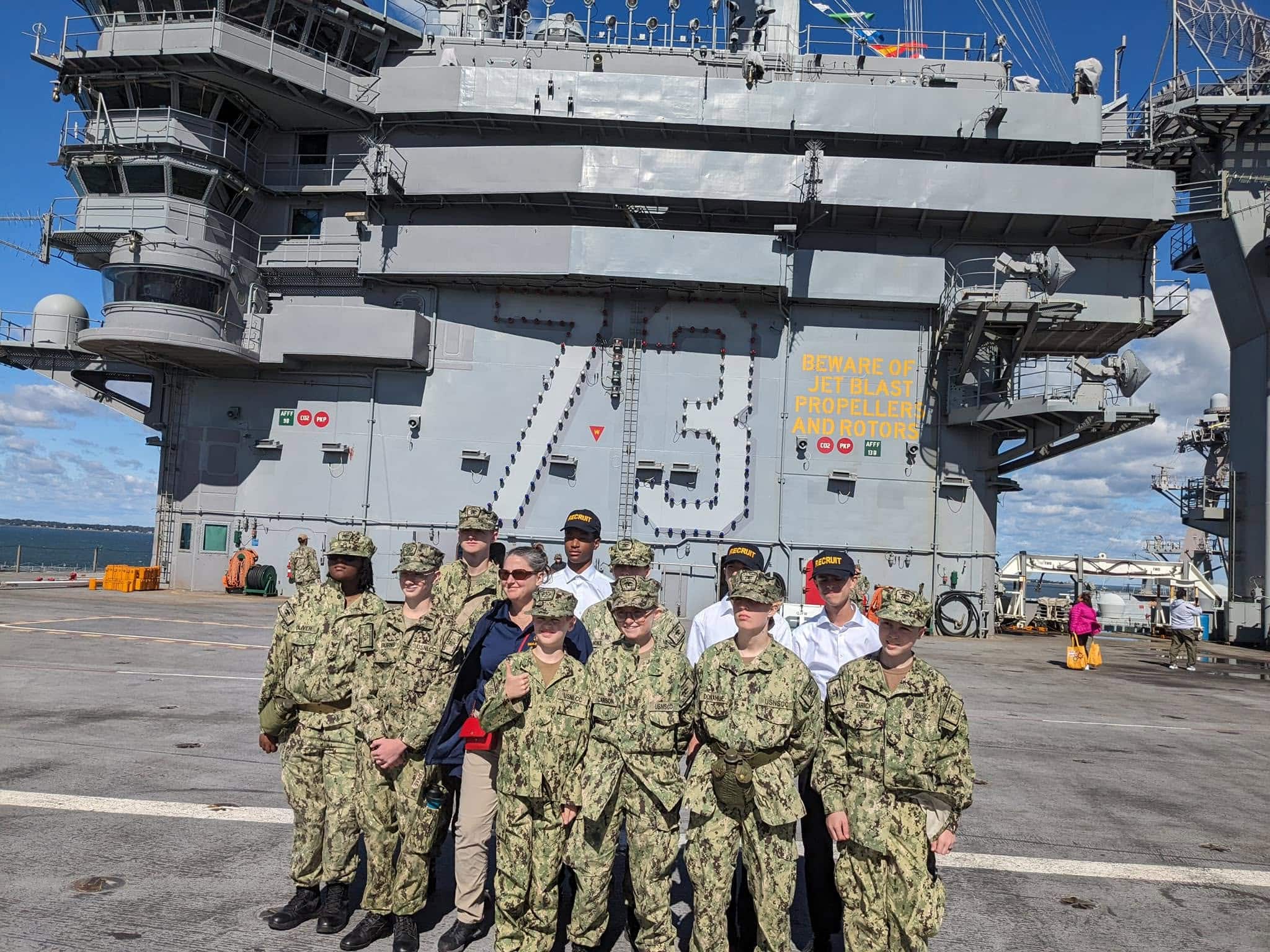 America Division cadets aboard an aircraft carrier during advanced naval training