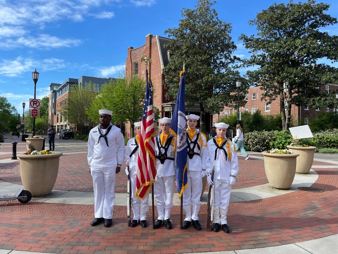 America Division color guard in white dress uniforms with American and Virginia state flags in Richmond