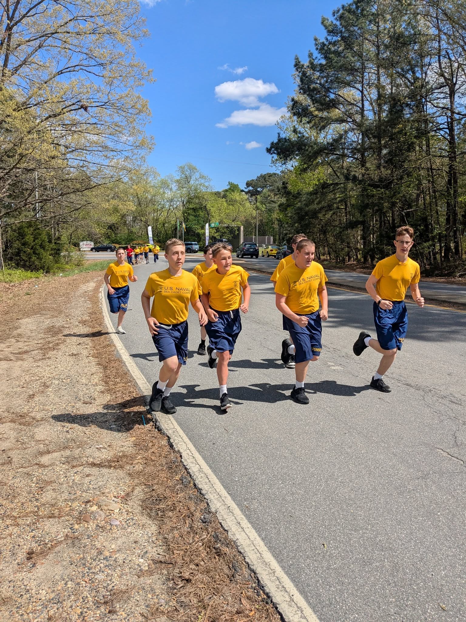 America Division Sea Cadets running in formation during physical training