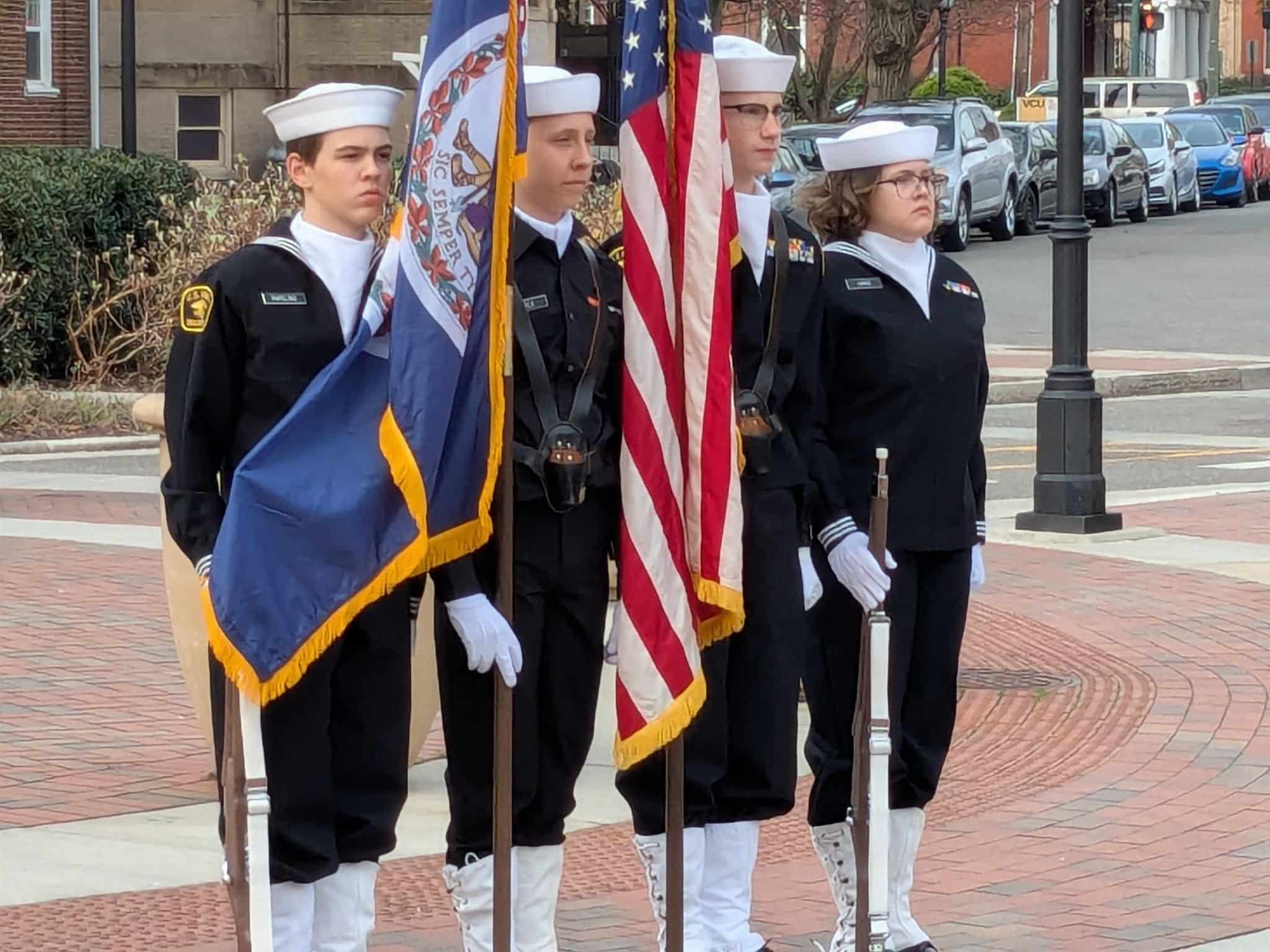Color guard in dress blues at a Richmond street ceremony near VCU