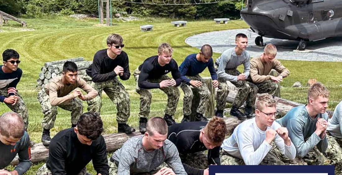Sea Cadets doing log PT during Naval Special Warfare Orientation Courses training